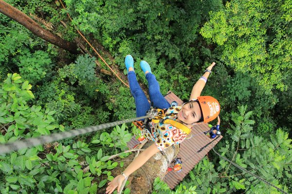 What are the best options for a holiday rental in the UK that offers zip-lining activities?